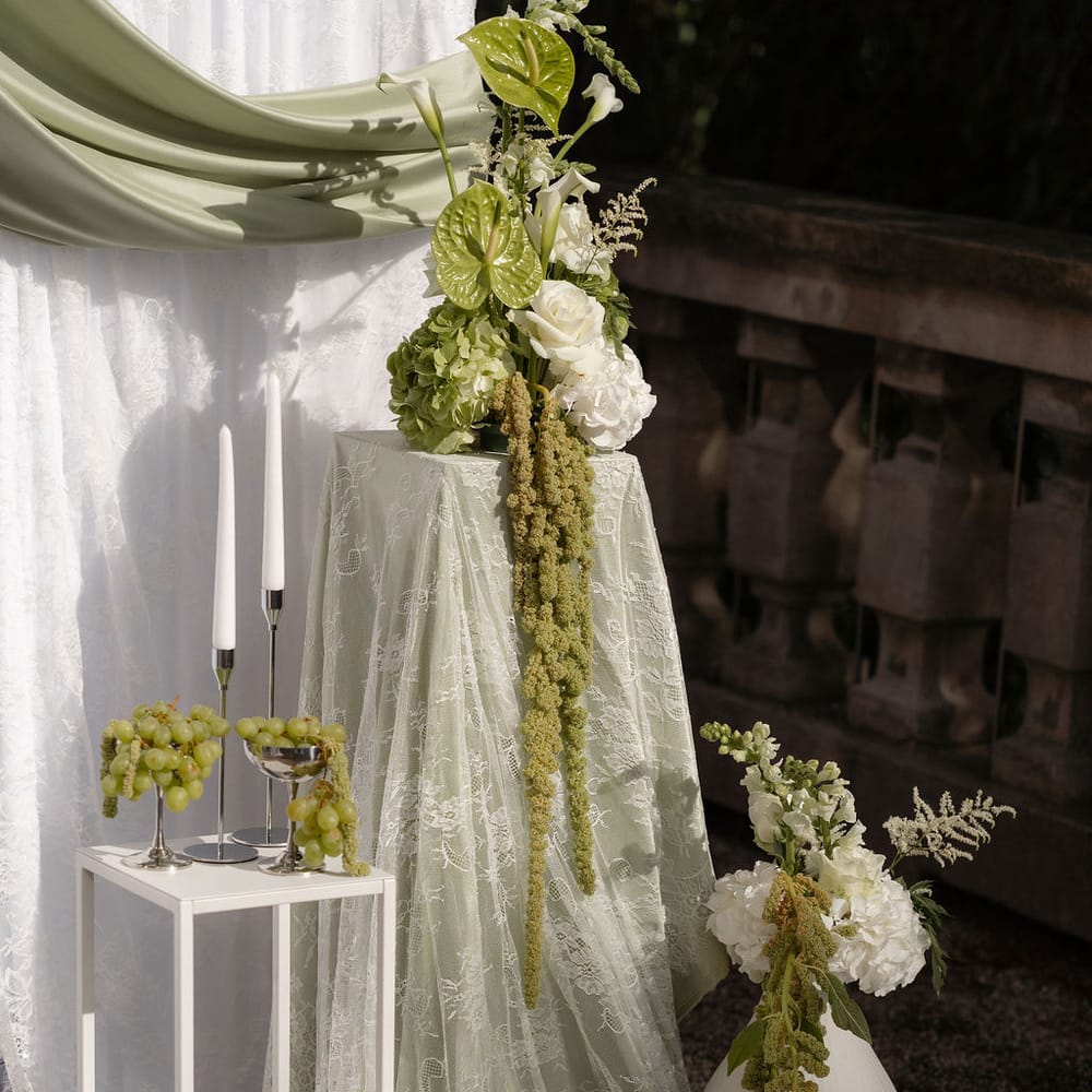 lace plinth floral spilling grapes