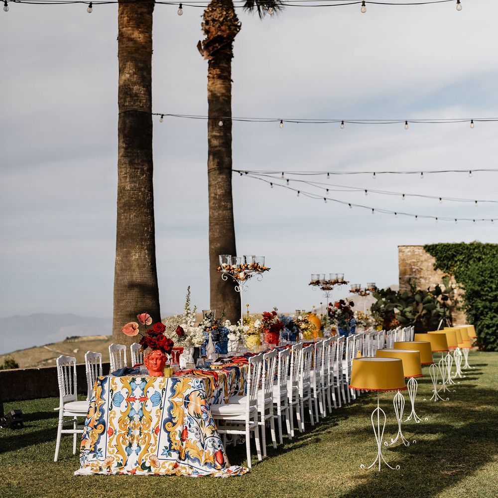 banquet tables under palmtrees