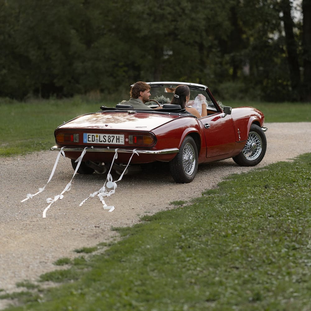 triumph convertible ribbon streamers getaway
