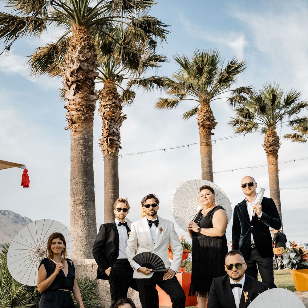 wedding party palm trees parasols
