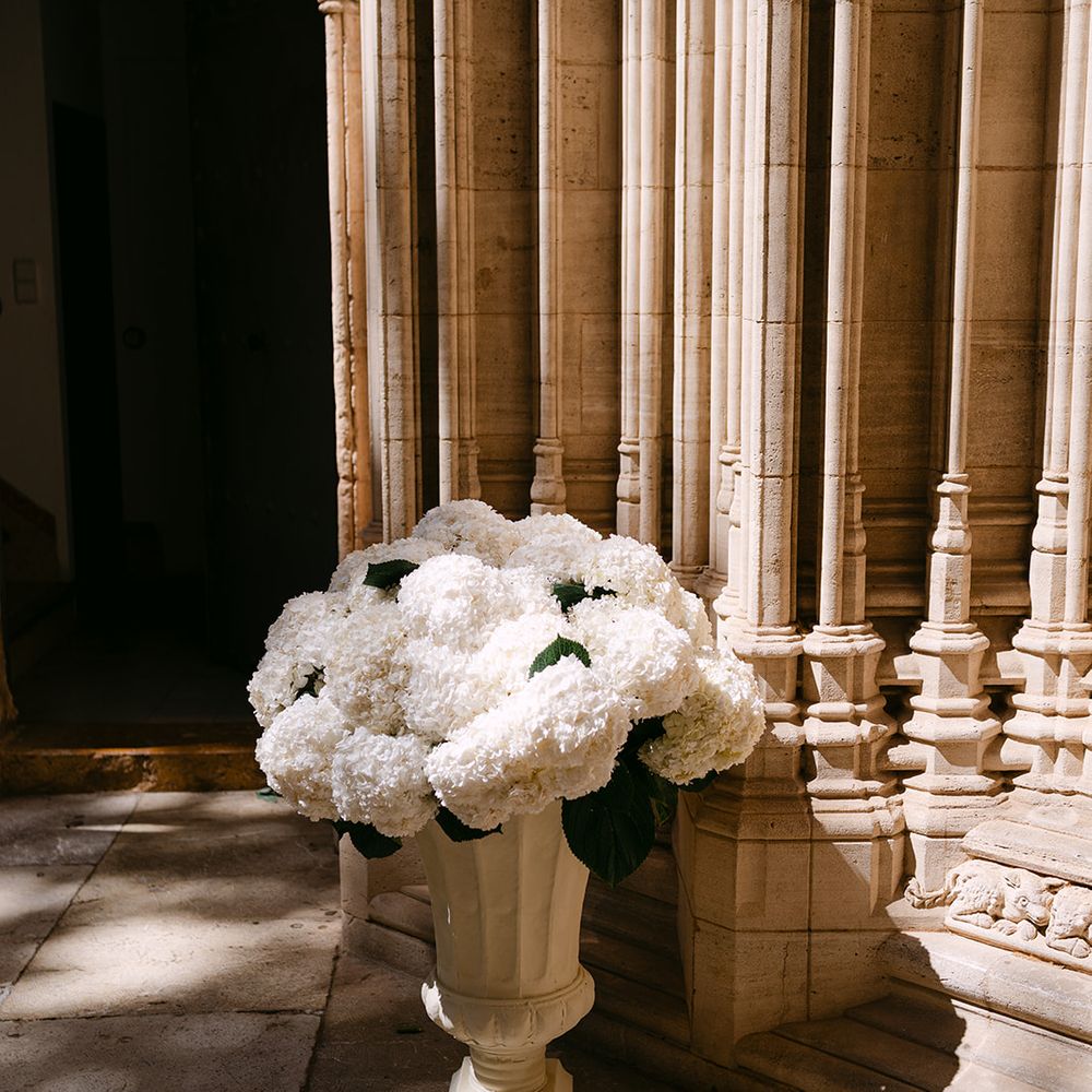 white hydrangea arrangement urn
