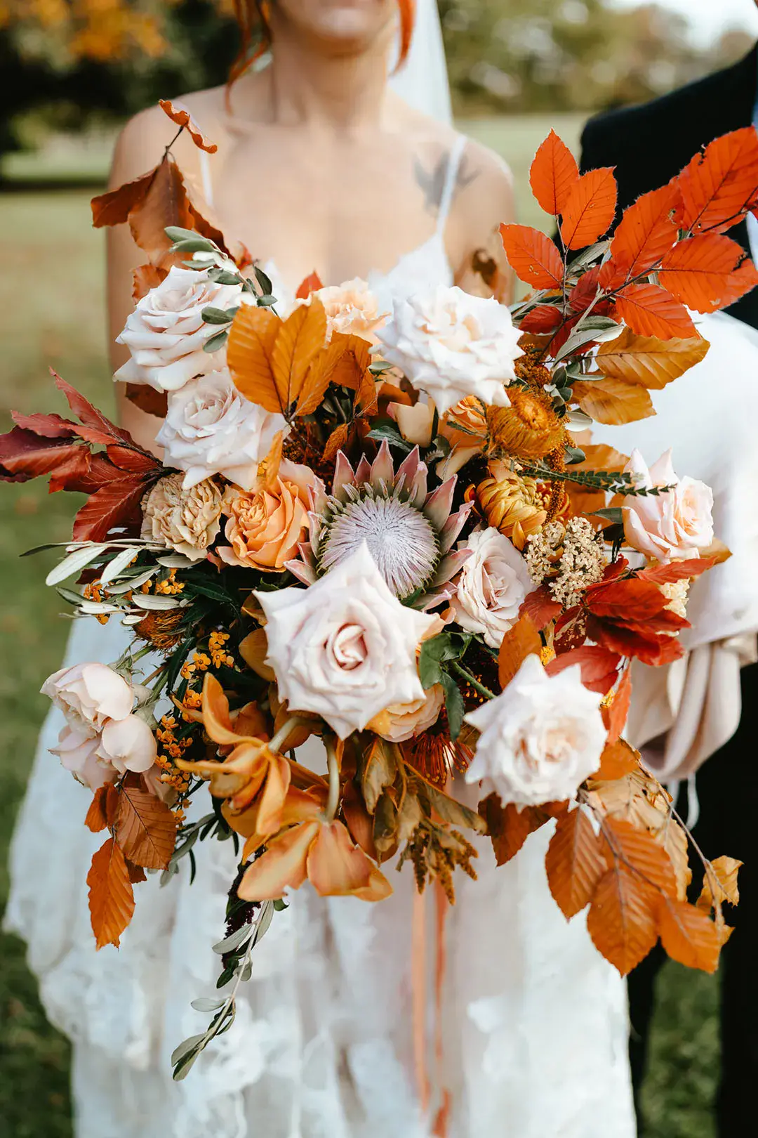 Burnt Orange Wedding Flowers, Stationery & Dresses At Reymerston Hall