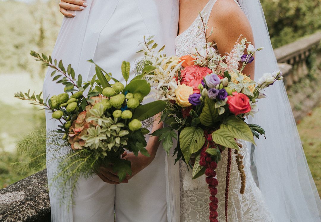 LGBTQI+ Wedding With Bridal Jumpsuit With Cape