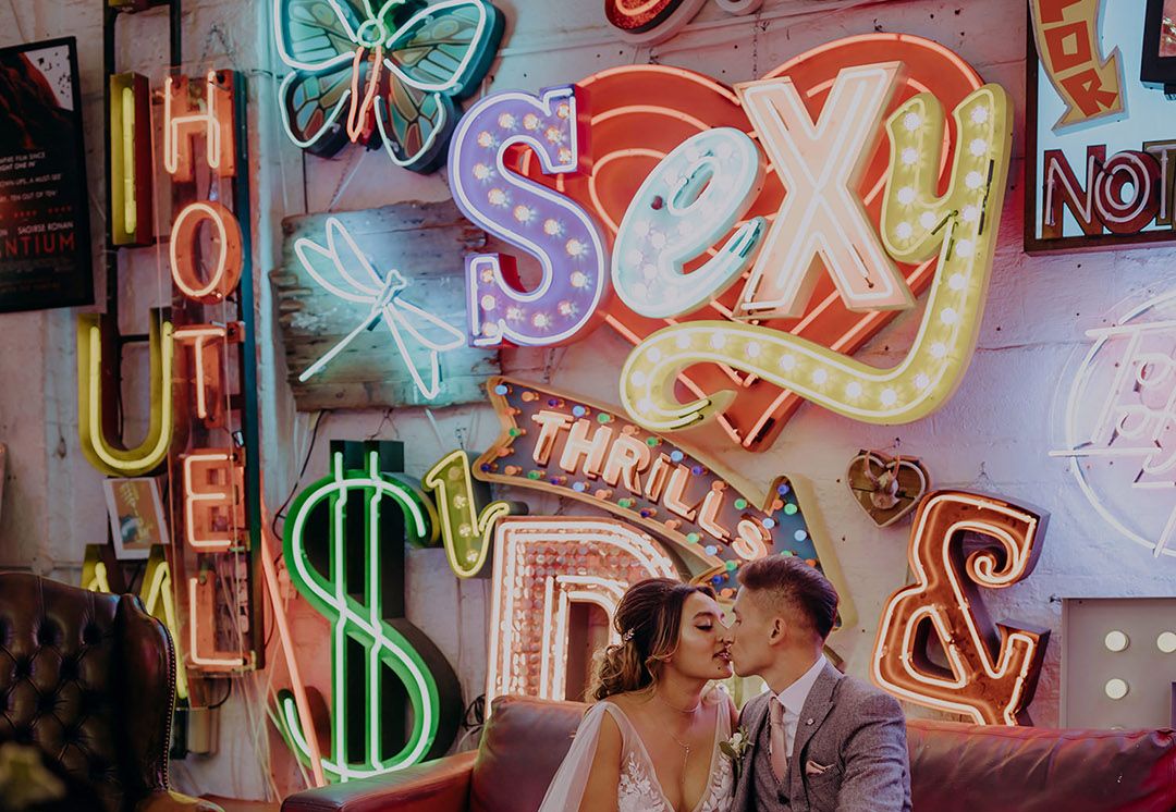 Gods Own Junkyard Wedding With Neon Signs & Lace Wedding Dress