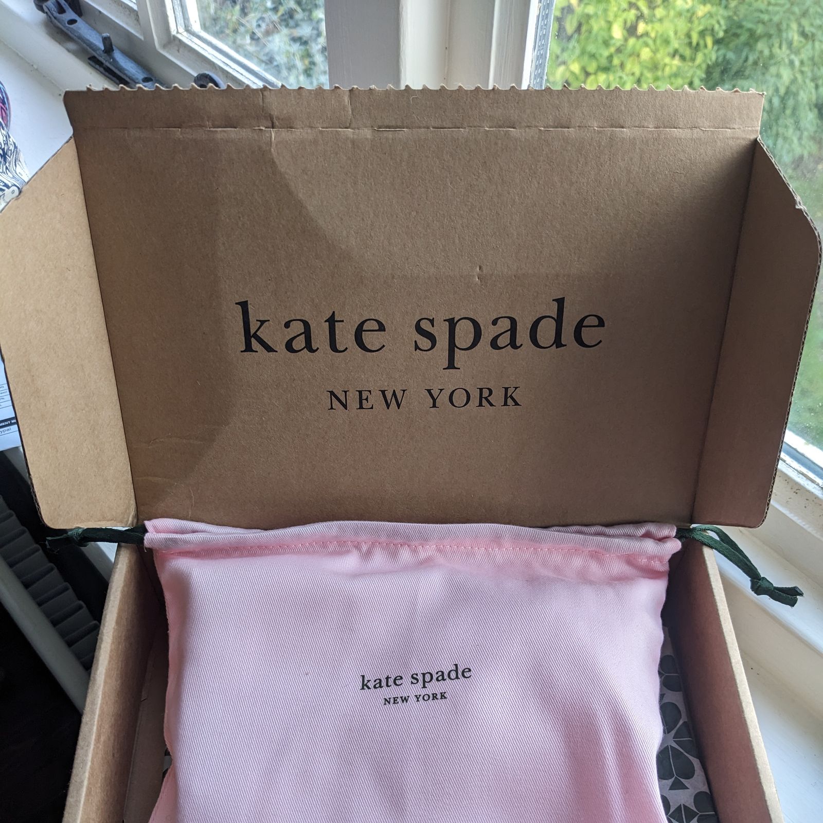 Kate spade dust hot sale bag uk