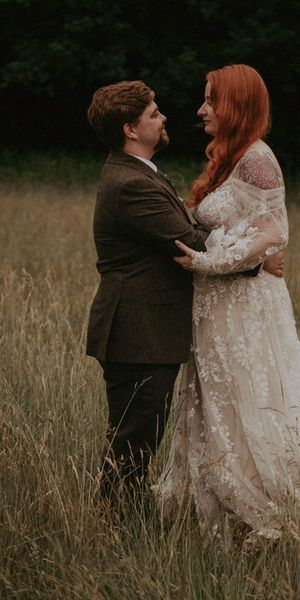 Lila's Wood outdoor wedding with the bride in boho lace wedding dress and groom. 