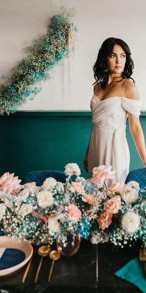 pink and teal wedding inspiration with gypsophila flowers, disco balls and stylish wedding dresses 