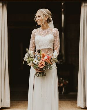 Bride in Catherine Dean wedding dress separates for chic Nancarrow Farm wedding.