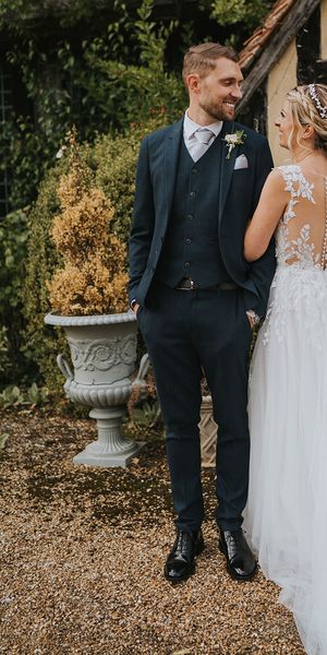 Dove Barn Weddings in Suffolk with the bride in a Dando London wedding dress.