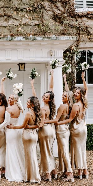 Black tie wedding at Northbrook Park with champagne gold bridesmaid dresses 