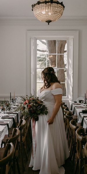 Aswarby Rectory wedding venue with the bride in a Madi Lane wedding dress