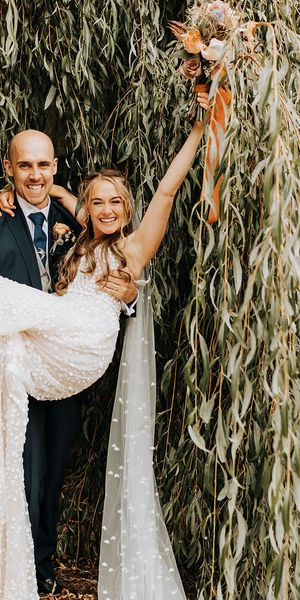 Duddon Mill Farm wedding with the bride in a lace wedding dress.