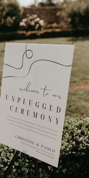 monochrome black and white unplugged wedding ceremony sign