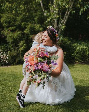 Kids at weddings at outdoor summer boho wedding.