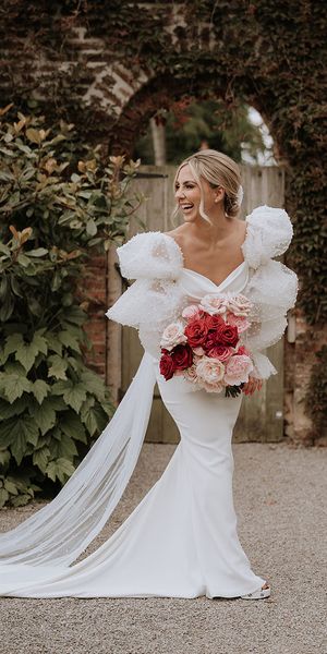 Red and pink wedding theme with the bride wearing a Chosen by Kyha wedding dress.