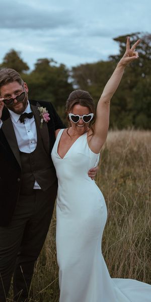 The Pear Tree Purton wedding with bride and groom wearing fun sunglasses.