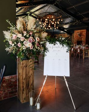 rustic barn wedding with wedding bouncy castle and sweet table