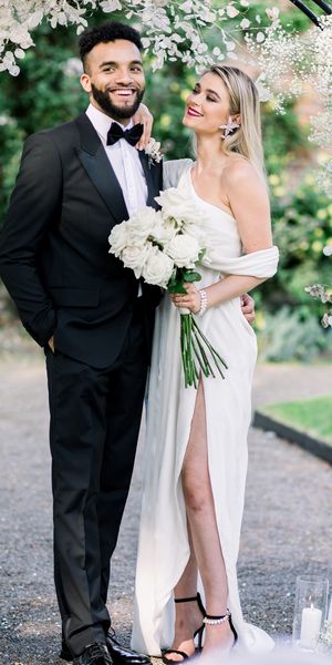 Sophisticated summer Garthmyl Hall wedding with white flowers and black-tie fashion