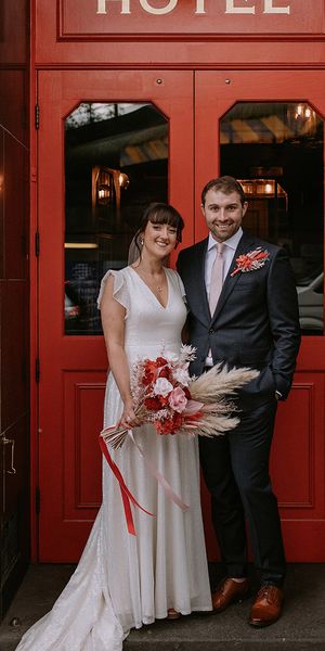 The Bedford in London wedding with bride in a sparkly wedding dress and groom in navy suit.