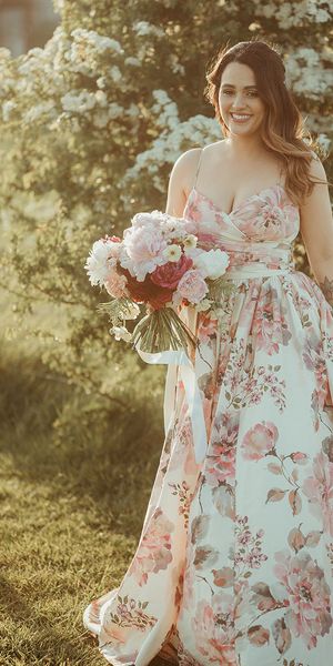 Bride in a hand painted silk wedding dress by Wendy Makin.