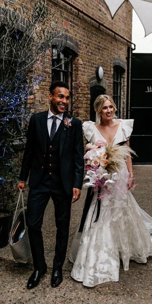 Contemporary London Wedding at The Loft Studios with Ruffle Wedding Dress by Epic Love Story 