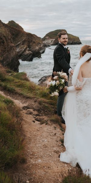 Coastal Watermouth Cove wedding with cute dogs