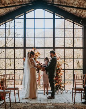 Hidden River Barn wedding in Carlisle with stunning large windows