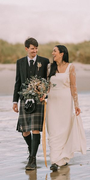 intimate beach scottish highlands wedding with bespoke wedding dress
