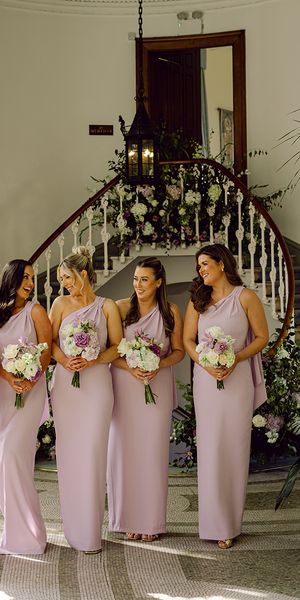 bridesmaids-wearing-lilac-bridesmaid-dresses