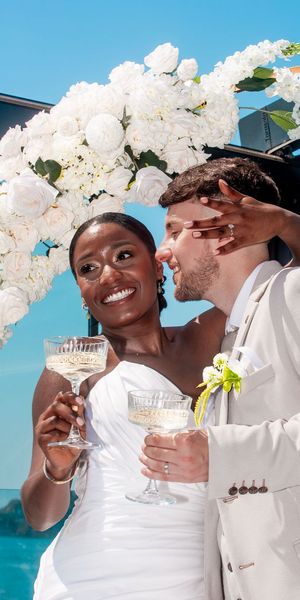 Bride and groom for coastal wedding by the sea