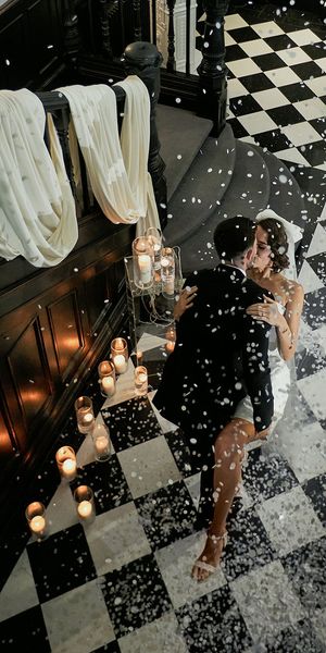 bride and groom confetti aerial shot kiss in vegas inspired editorial shoot