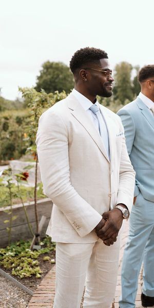 Light blue best man wedding suit and white groom suit