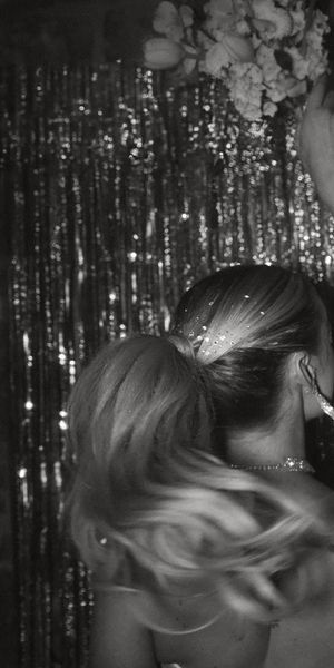 Bride wearing a strapless sparkly wedding dress for London hen do