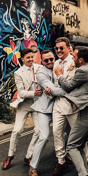 groom and groomsmen celebrating east london wedding