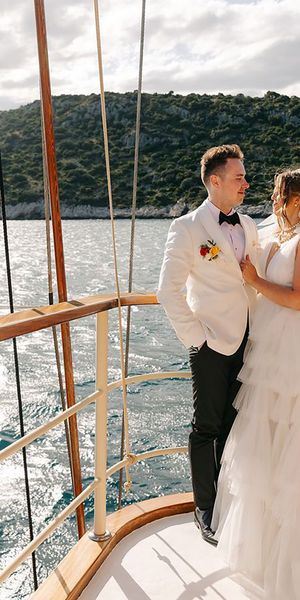 Bride and groom posing for picture at boat wedding in Split