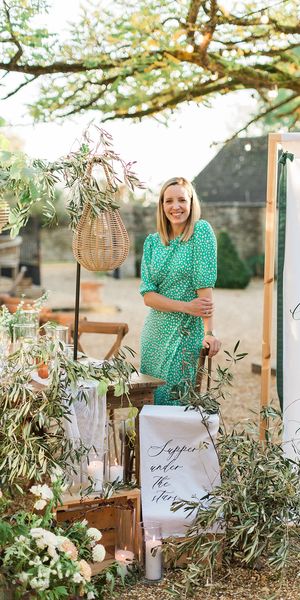 This is me in front of a Tuscan inspired tablescape at Merriscourt in the Cotswolds