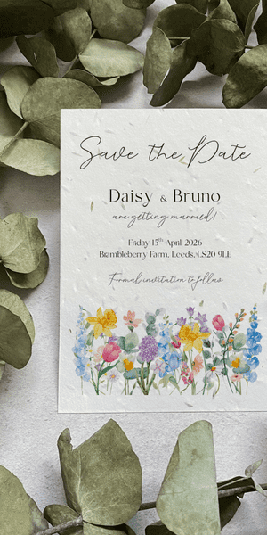 Spring Meadow save the dates printed on seed paper.