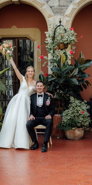 Caitlin & Kevin couple's portrait in the stunning conservatory at Clevedon Hall by Just James Weddings