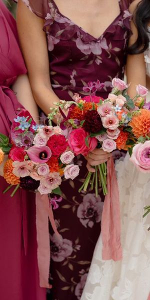 Pink and orange bridal flowers by Frances McMahon Photography. 