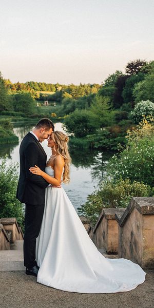 Bride and Groom holding each other at Foxtail Barns by Jacob Boodrie Photography