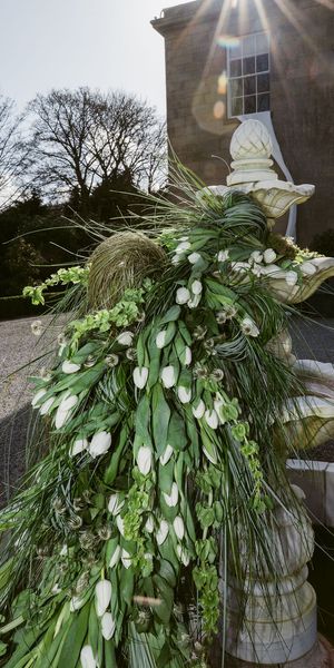 A non-working fountain brought back to life through flowers . Photo credit @paulinaharstonphotography 