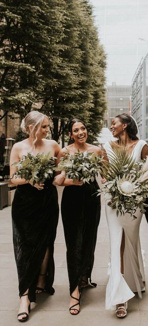 bridal-party-wearing-black-bridesmaid-dresses