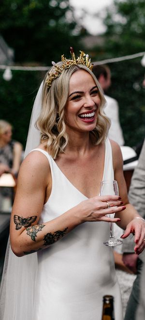 bride wearing a gold bridal crown