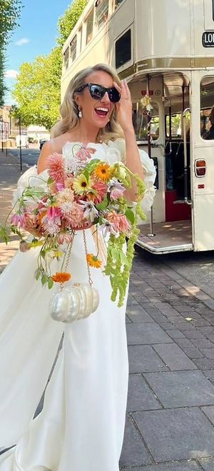 Bride wearing cult gaia rented wedding dress from by rotation