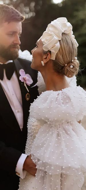 bride-with-pearl-puff-sleeves-with-groom-at-golden-hour