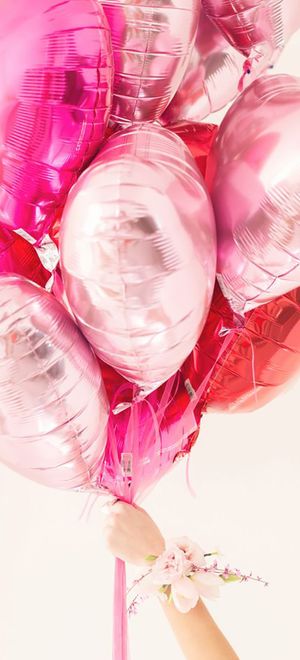 pink love heart balloons for Valentine's Day theme wedding shoot