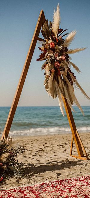 beach picnic set-up for beach honeymoon location or destination wedding