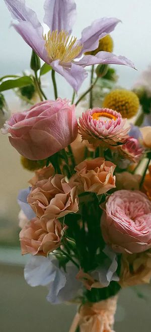 pink, blue, peach and orange pastel bridal bouquet