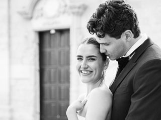 Black and white image of a bride and groom cuddling at a wedding in Puglia