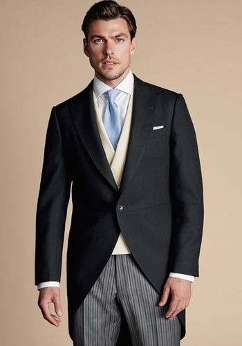 Bridgerton themed wedding dress code outfit idea for men from Charles Tyrwhitt - Morning-suit-tail-coat-black-herringbone